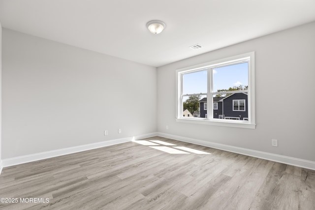 204 Morningside Ave, Union Beach, NJ 07735 - spare room featuring baseboards and light wood-style floors
