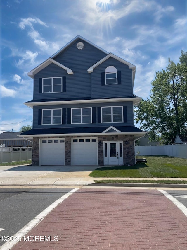 204 Morningside Ave, Union Beach, NJ 07735 - view of front of home featuring driveway, a garage, and stone siding