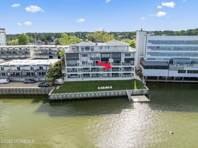138 Bodman Pl Unit 5, Red Bank, NJ 07701 - dock featuring a water view and a yard