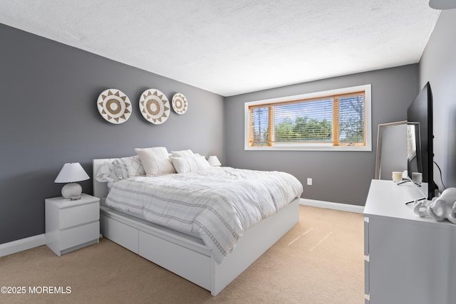 138 Bodman Pl Unit 5, Red Bank, NJ 07701 - bedroom with light colored carpet, baseboards, and a textured ceiling