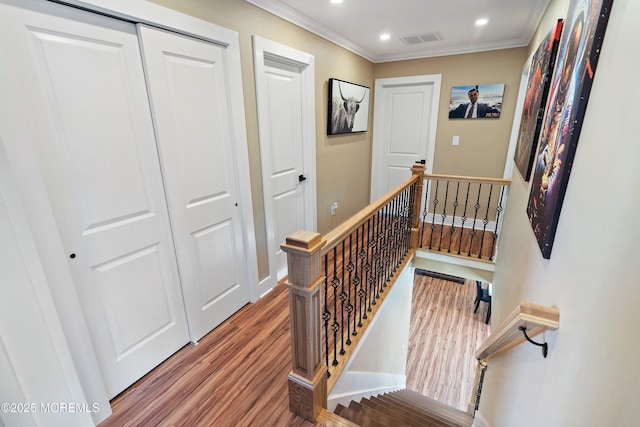 131 Locust St, Tuckerton, NJ 08087 - stairway featuring wood finished floors, visible vents, recessed lighting, crown molding, and baseboards