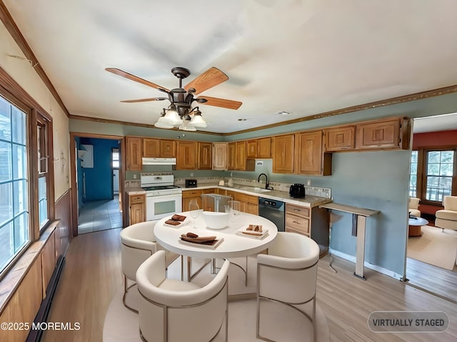 kitchen featuring a sink, dishwasher, under cabinet range hood, white stove, and light wood-style floors