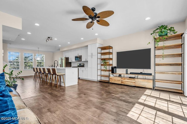 600 Grand Ave Unit 7C, Asbury Park, NJ 07712 - living area featuring a ceiling fan, wood finished floors, and recessed lighting