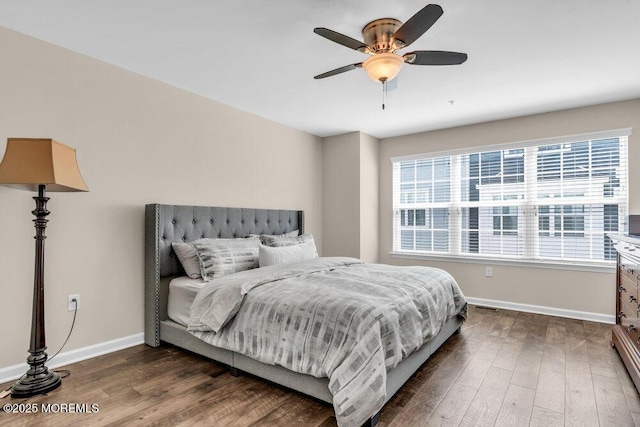 600 Grand Ave Unit 7C, Asbury Park, NJ 07712 - bedroom with dark wood-style floors, baseboards, and a ceiling fan