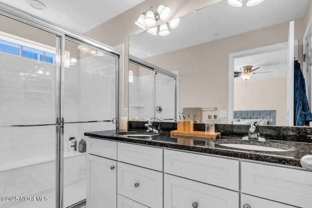 600 Grand Ave Unit 7C, Asbury Park, NJ 07712 - bathroom with a shower stall, double vanity, and a ceiling fan