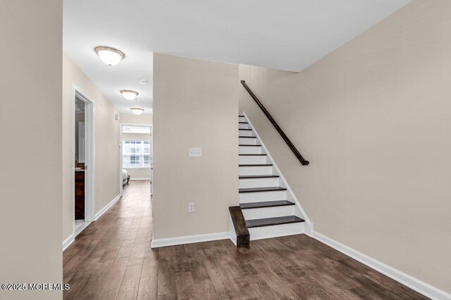 600 Grand Ave Unit 7C, Asbury Park, NJ 07712 - stairs with wood finished floors and baseboards