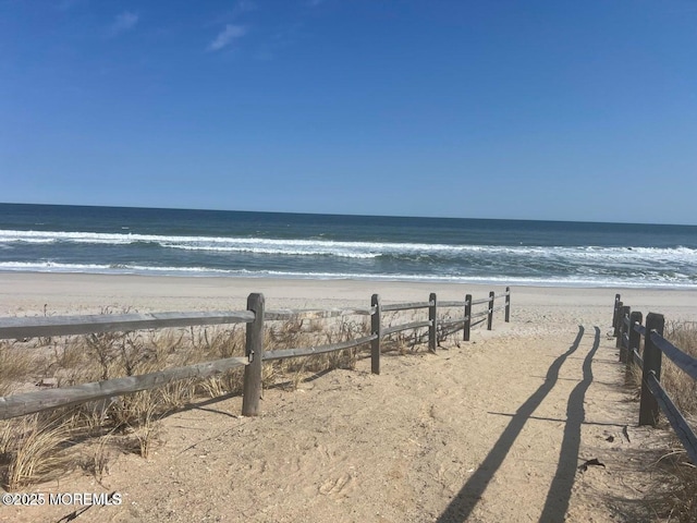6 Shell Rd, Mantoloking, NJ 08738 - water view with fence and nearby beach