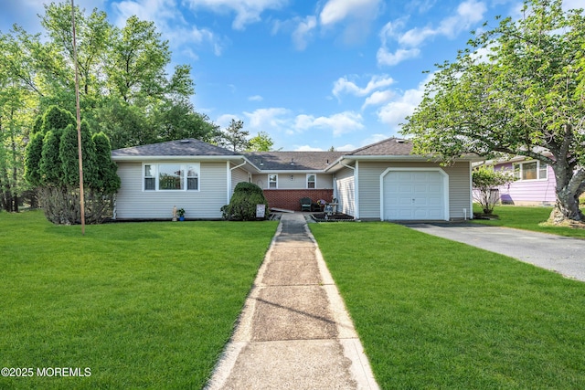 single story home with driveway, a front yard, an attached garage, and a shingled roof