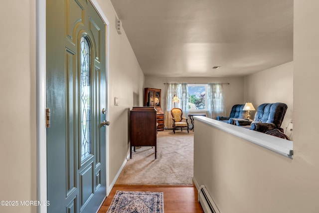 foyer entrance featuring wood finished floors