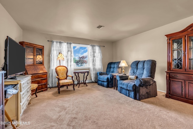 sitting room with light colored carpet