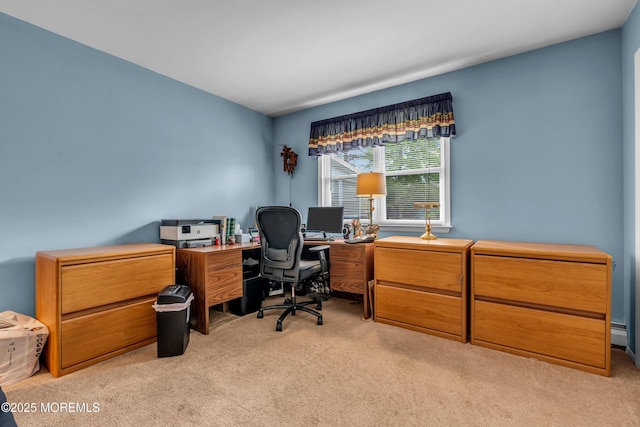 office area with light colored carpet and a baseboard heating unit