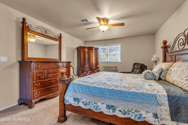 bedroom featuring light carpet, a ceiling fan, and baseboards