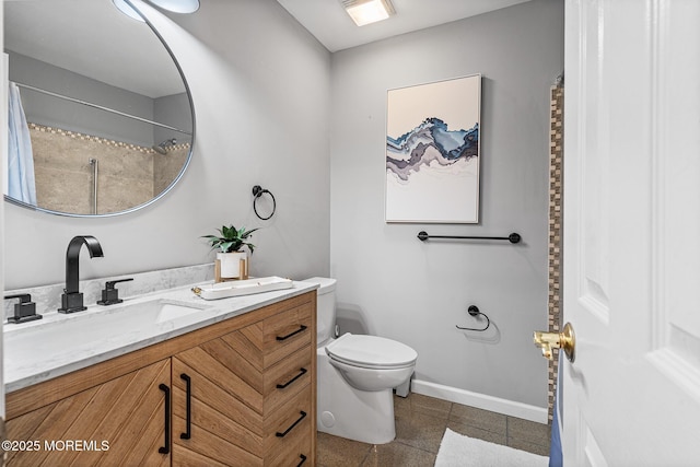 9 Zapata Ct, Toms River, NJ 08757 - bathroom with toilet, vanity, and baseboards