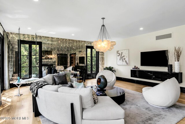 5 Laurel Ln, Rumson, NJ 07760 - living area with wood finished floors, plenty of natural light, a chandelier, recessed lighting, and baseboards