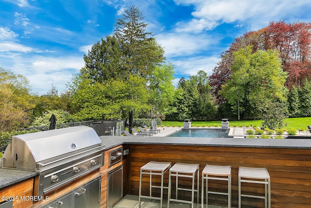 5 Laurel Ln, Rumson, NJ 07760 - view of patio / terrace with an outdoor pool, an outdoor bar, and view of scattered trees