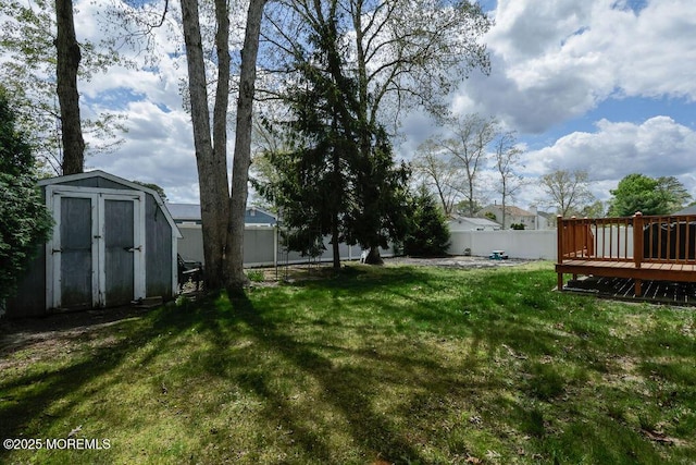204 Stormy Rd, Manahawkin, NJ 08050 - view of yard with a shed, a wooden deck, and an outbuilding