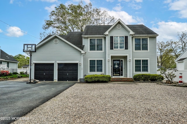 204 Stormy Rd, Manahawkin, NJ 08050 - view of front facade featuring driveway, an attached garage, and fence