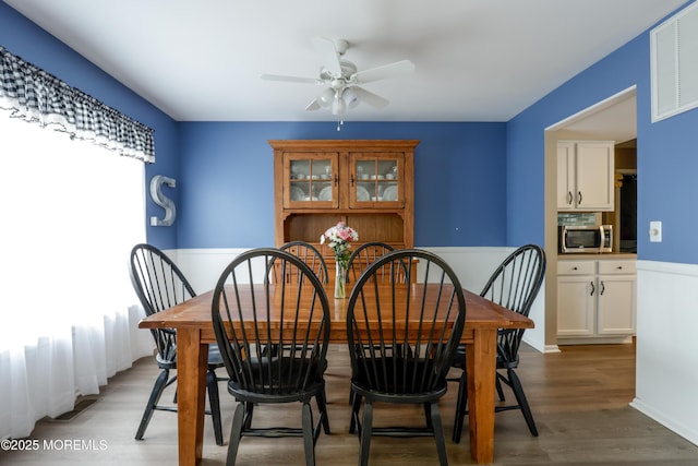 204 Stormy Rd, Manahawkin, NJ 08050 - dining space with ceiling fan and wood finished floors