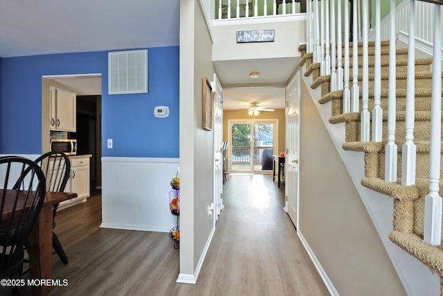 204 Stormy Rd, Manahawkin, NJ 08050 - hall with wood finished floors, stairs, and baseboards