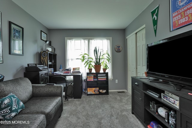 204 Stormy Rd, Manahawkin, NJ 08050 - living area featuring carpet, a desk, and baseboards