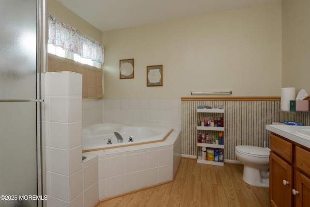 204 Stormy Rd, Manahawkin, NJ 08050 - full bathroom featuring wood finished floors, a bath, vanity, toilet, and a shower with door