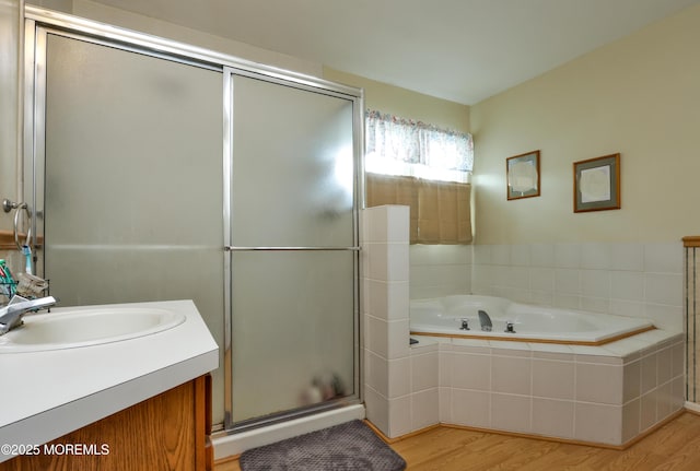 204 Stormy Rd, Manahawkin, NJ 08050 - full bath featuring wood finished floors, a stall shower, a garden tub, and vanity