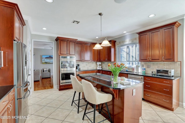 460 Christine Ct, Freehold, NJ 07728 - kitchen featuring visible vents, crown molding, light tile patterned floors, dark countertops, and appliances with stainless steel finishes