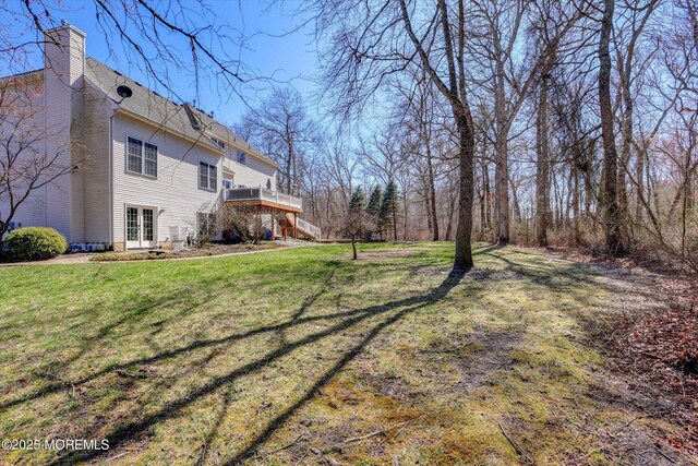 460 Christine Ct, Freehold, NJ 07728 - view of yard with stairway, a wooden deck, and french doors
