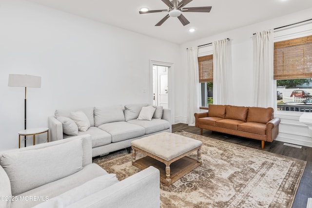 living area featuring a ceiling fan, wood finished floors, plenty of natural light, and recessed lighting