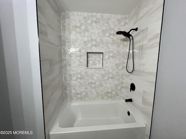 bathroom with shower / bathtub combination
