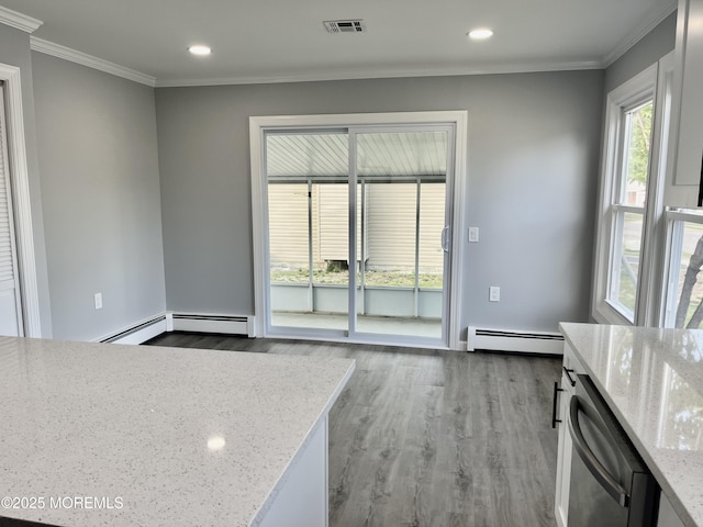 unfurnished dining area with a baseboard radiator, dark wood-style flooring, crown molding, and recessed lighting
