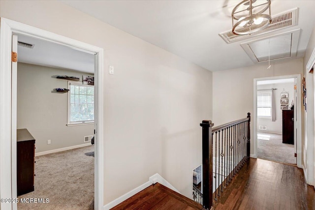 733 Colts Neck Rd, Freehold, NJ 07728 - hall with attic access, an upstairs landing, baseboards, and carpet floors