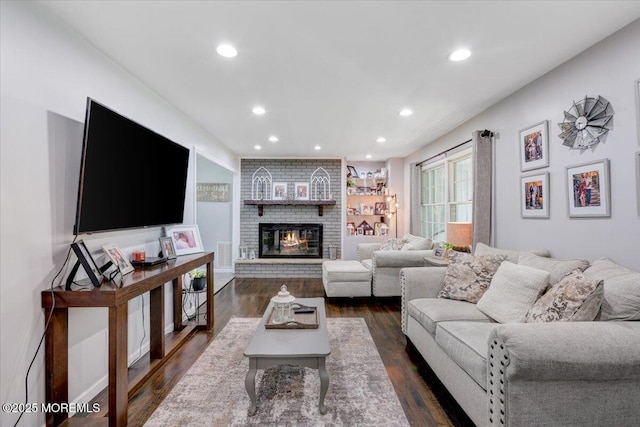 733 Colts Neck Rd, Freehold, NJ 07728 - living room featuring dark wood-style floors, a fireplace, and recessed lighting