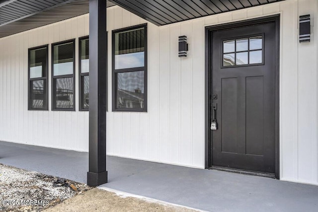 entrance to property with covered porch