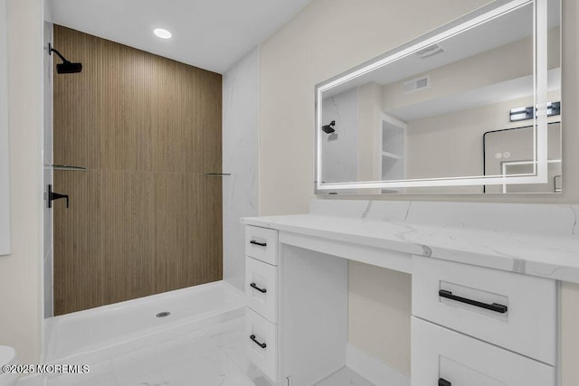 full bathroom featuring a shower, visible vents, marble finish floor, vanity, and recessed lighting