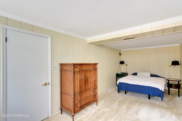 bedroom with light colored carpet and ornamental molding
