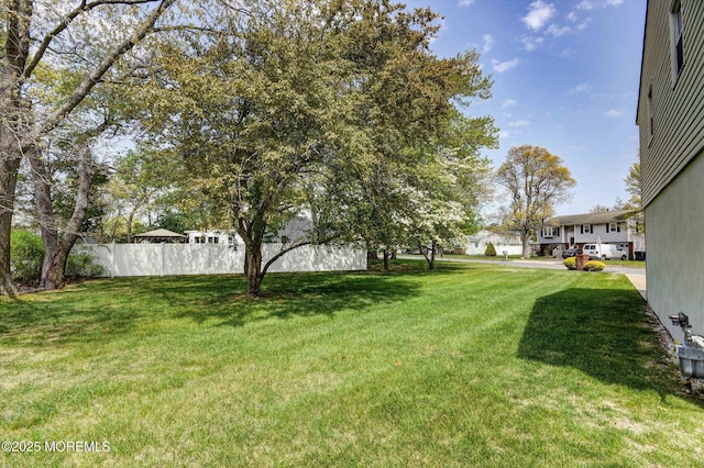 view of yard featuring fence