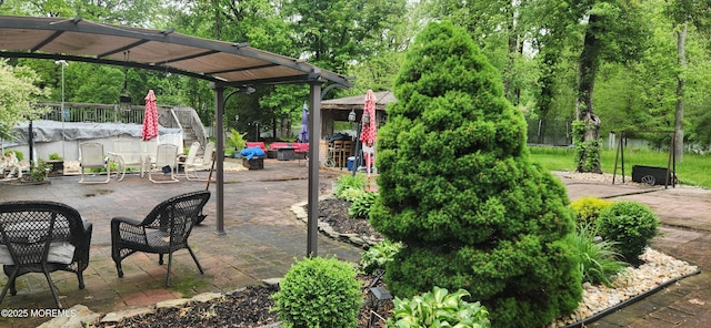 view of patio featuring a pergola
