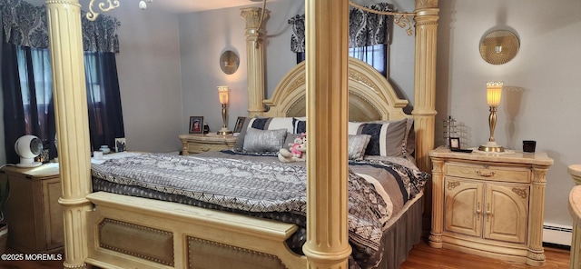 95 Gravel Hill Spotswood Rd, Monroe, NJ 08831 - bedroom featuring wood finished floors, baseboard heating, and decorative columns