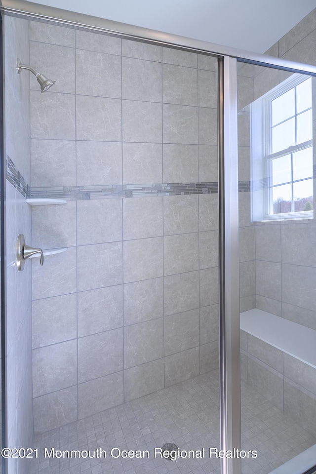 bathroom with a stall shower