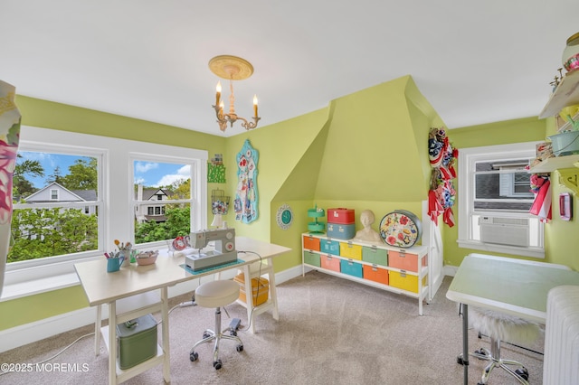 office area with baseboards, carpet, a chandelier, and cooling unit