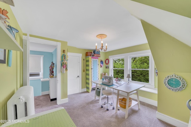 carpeted office with a chandelier, baseboards, and radiator heating unit