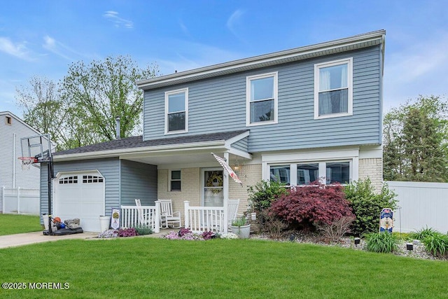 4 Dantley Dr, Howell, NJ 07731 - traditional-style house with covered porch, an attached garage, and brick siding