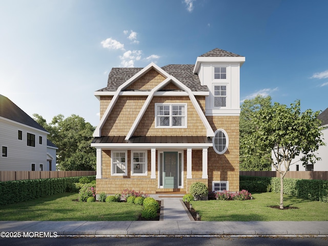 view of front facade with a standing seam roof, metal roof, covered porch, and a shingled roof