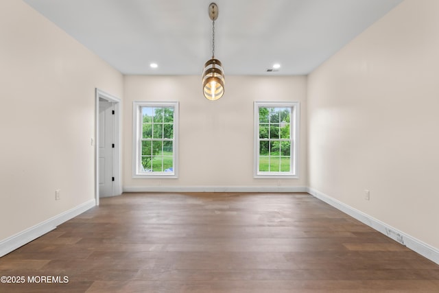 38 Louise Dr, East Brunswick, NJ 08816 - unfurnished dining area with healthy amount of natural light, wood finished floors, baseboards, and recessed lighting