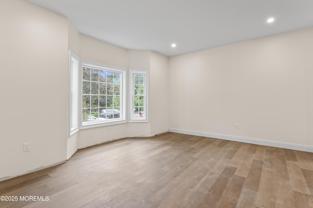 38 Louise Dr, East Brunswick, NJ 08816 - spare room featuring wood finished floors, recessed lighting, and baseboards