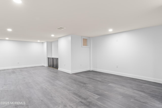 38 Louise Dr, East Brunswick, NJ 08816 - finished below grade area with recessed lighting, dark wood-style flooring, and baseboards