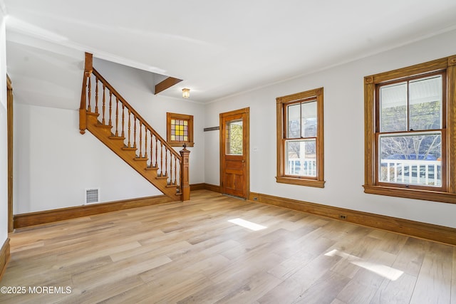 555 Cedar Ave, West Long Branch, NJ 07764 - foyer featuring baseboards, light wood-type flooring, and stairway