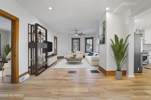 555 Cedar Ave, West Long Branch, NJ 07764 - living room with light wood-style floors, ceiling fan, recessed lighting, and baseboards