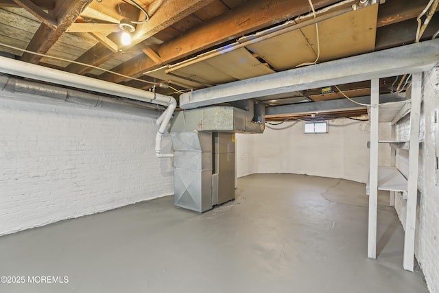 555 Cedar Ave, West Long Branch, NJ 07764 - below grade area with heating unit and brick wall